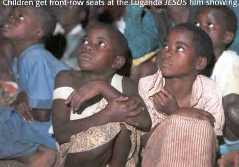Children watch the Jesus Film in Luganda