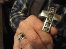 My ring and the cross around my neck help me to share Christ